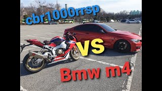 cbr1000rrsp riding with bmw m4